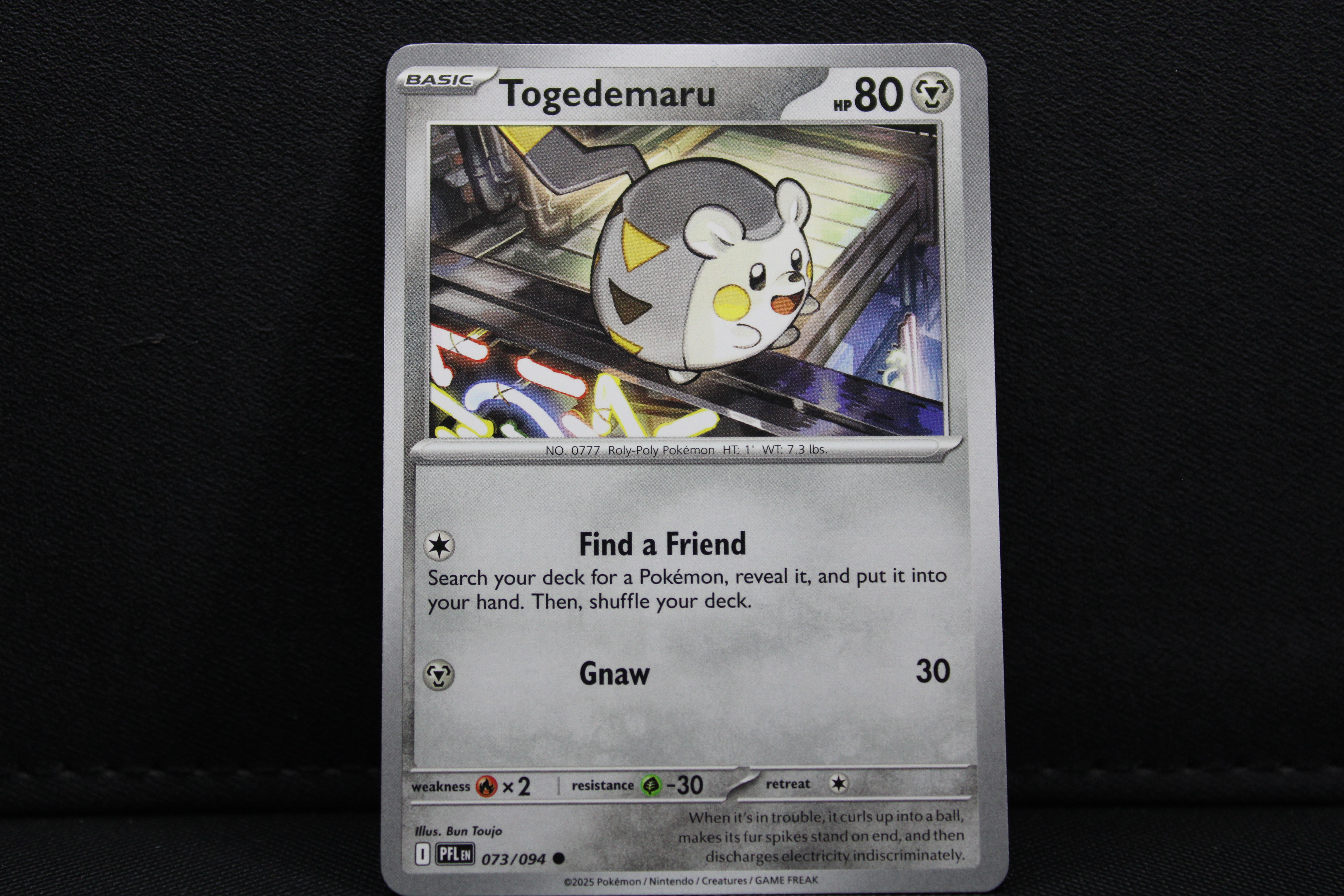 Togedemaru 073/094 - Non Holo, ME Phantasmal Flames