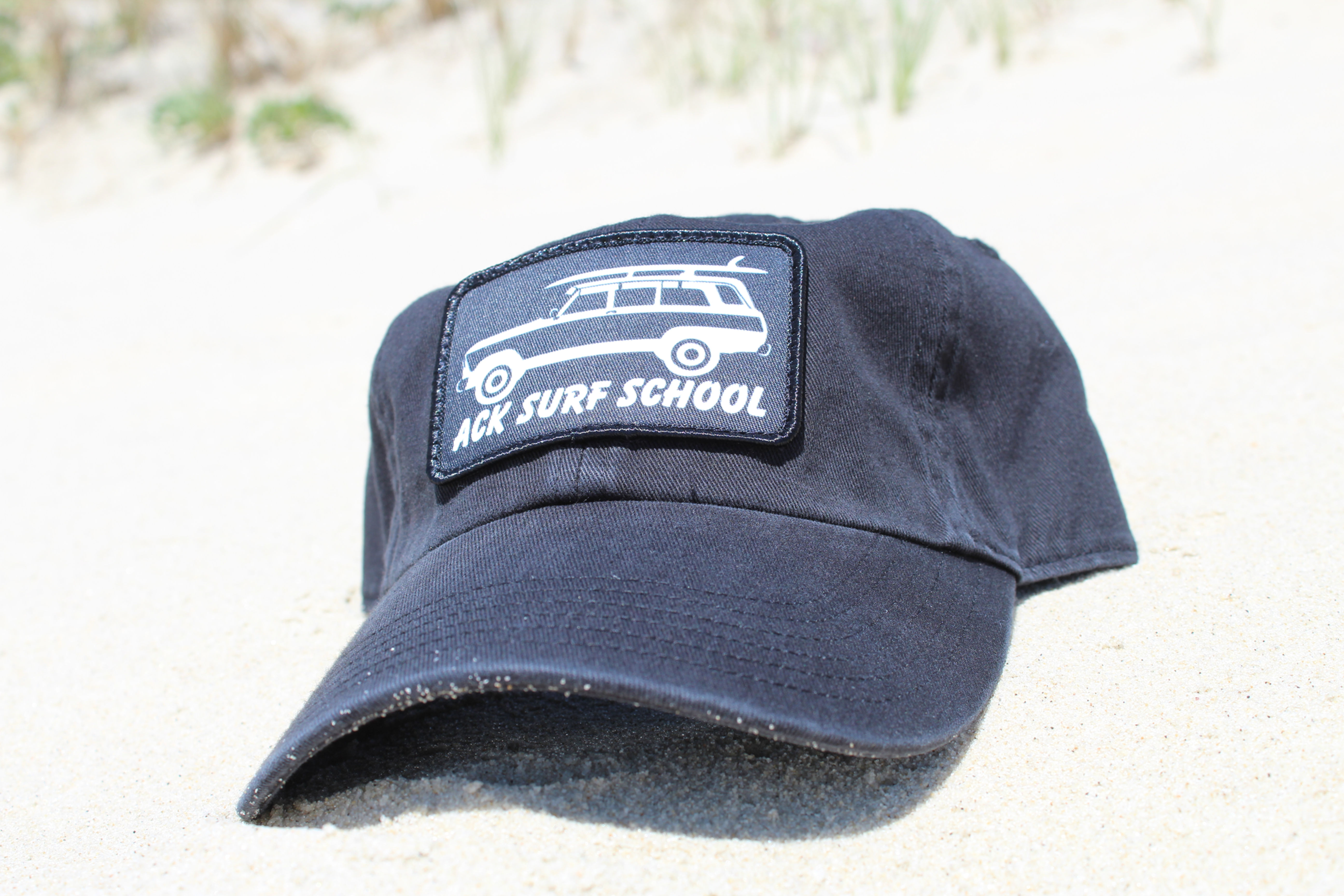 All black 'Dad Hat' with adjustable strap in the back