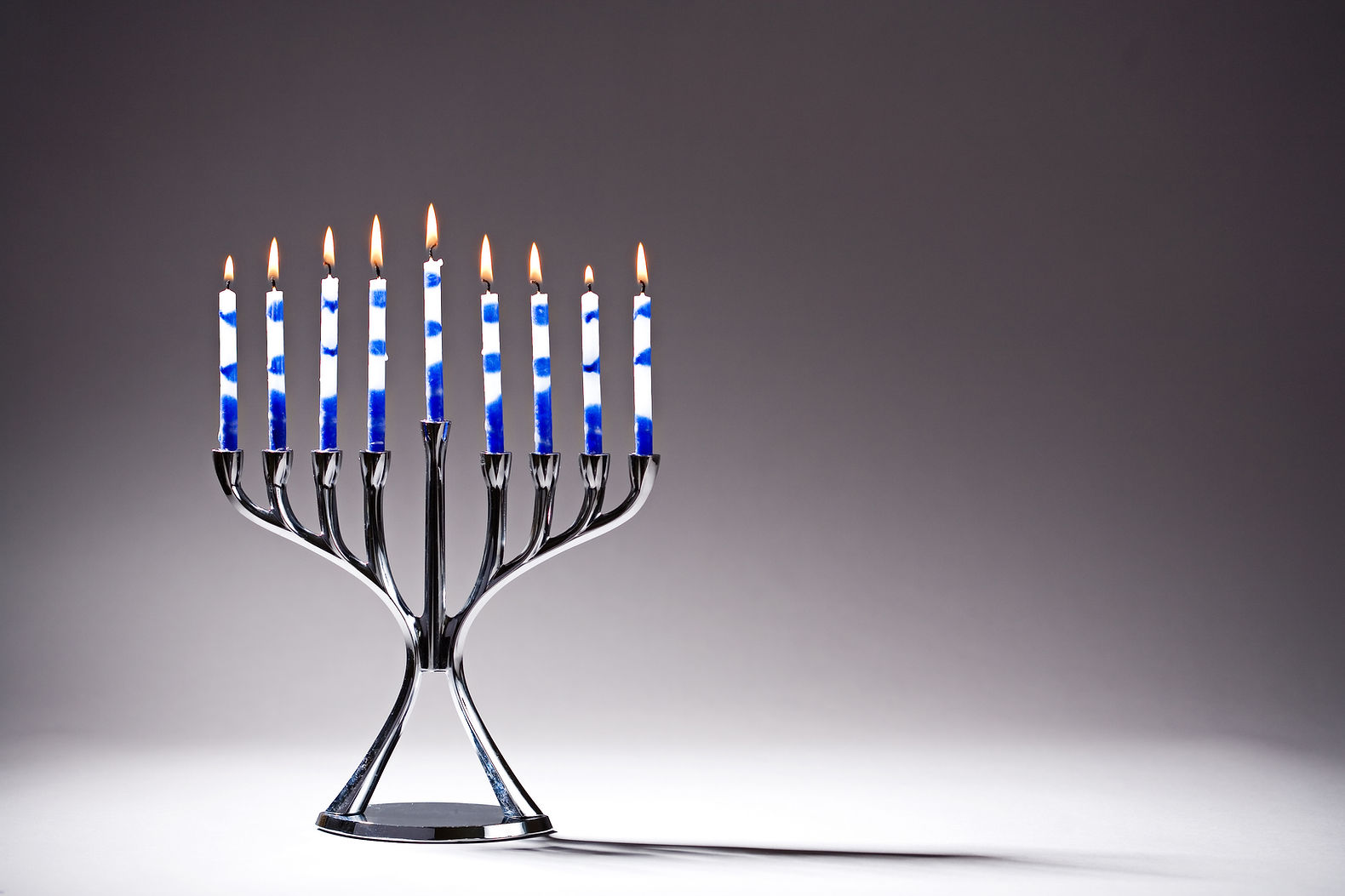 Lit Candles on Stand