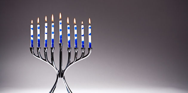 Lit Candles on Stand