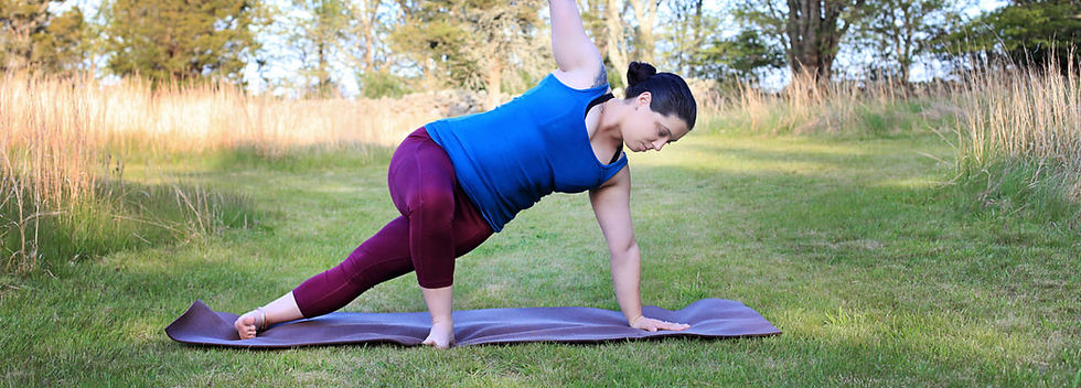 Jess in a modified side plank outdoors