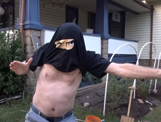 Man wearing Ninja In Disguise t-shirt