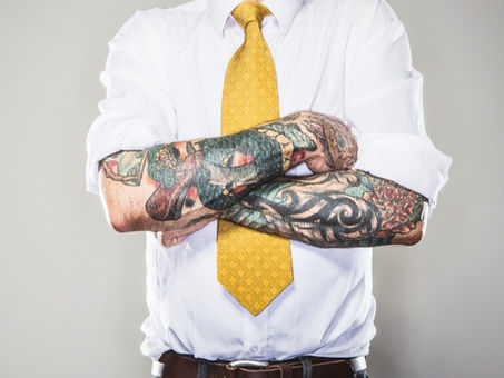 Local Man Gets Sleeve Tattoos After Attending Music Festival - Satire