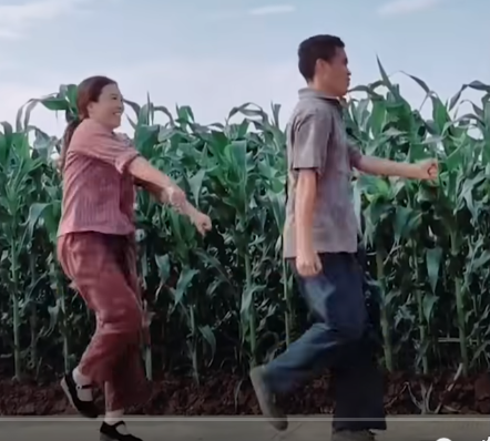 Chinese farming couple dancing
