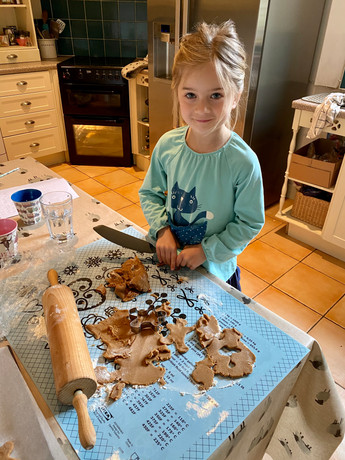 baking gingerbread men.jpeg