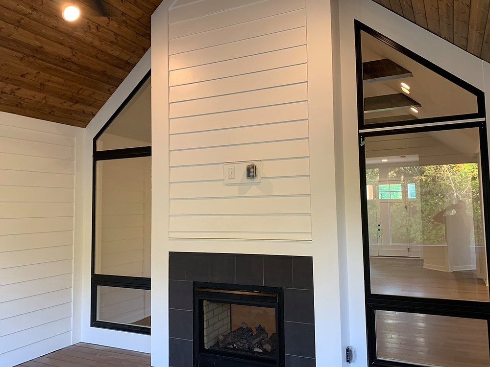 Outdoor fireplace designed by Cincinnati custom home builder, the Robert Lucke Group