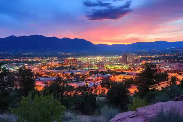 Static image of the Colorado Springs Skyline during twilight.