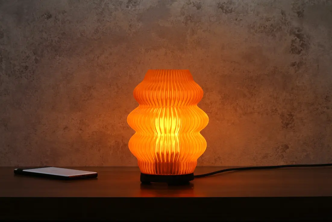 Noir Ripple lamp in a curated interior setup with earthy tones and a vintage feel