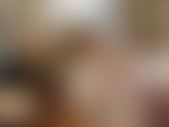 This cozy room features a playful blend of greenery and natural elements, enhanced by personalized lighting and abundant sunlight, creating a serene and inviting atmosphere.