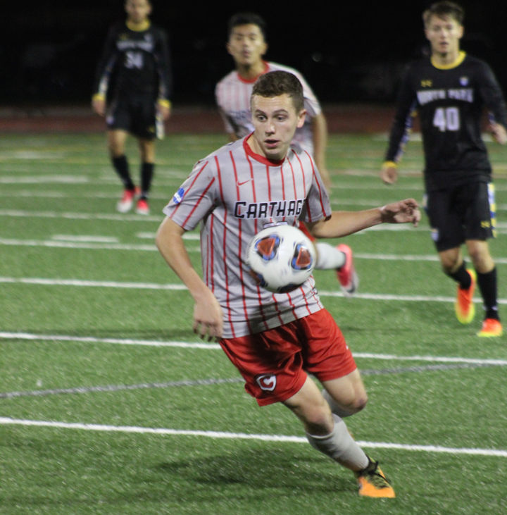 Red Men to Drive to Decatur for Next CCIW Match