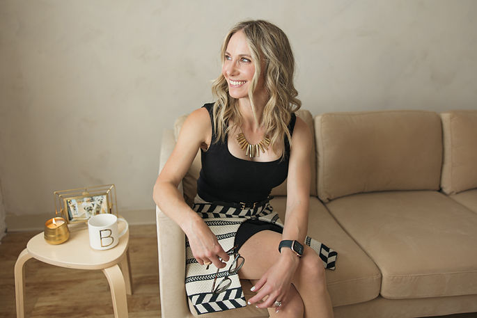 Britt-Ritchie-On-Couch-Looking-Out-Window