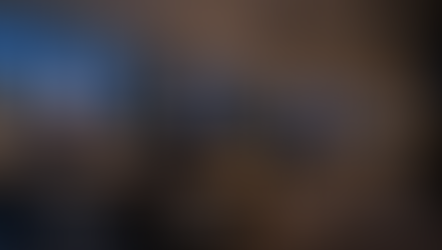 AI-generated view of an empty office at dusk with ceiling ventilation diffusers.