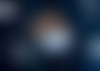 A hand touches a digital screen with data icons, graphs, and cloud symbols, on a dark, futuristic background.