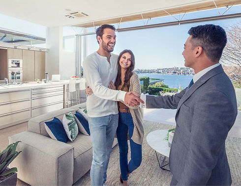 Couple being congratulated for buying an off the plan appartment. 001