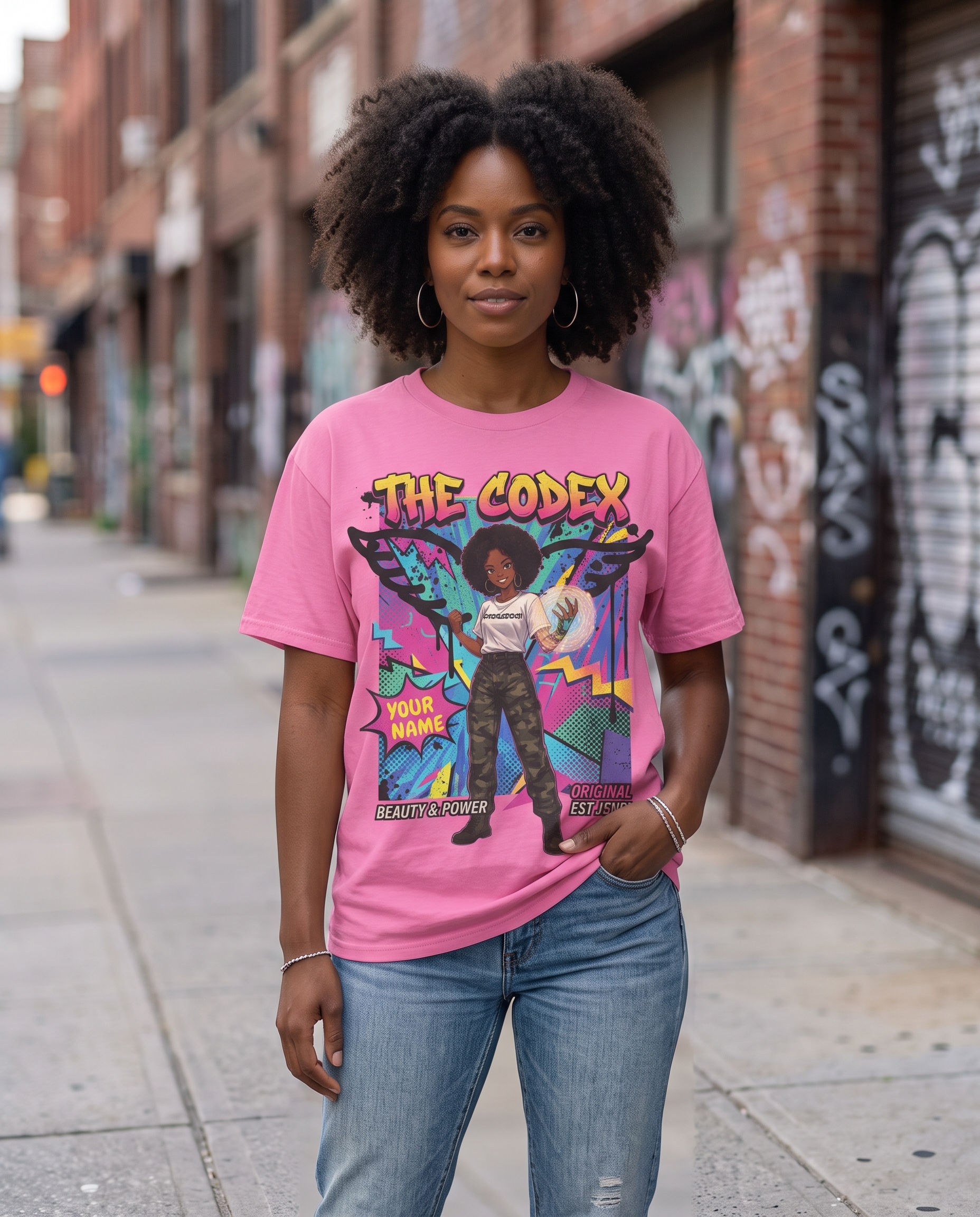 a black girl with coily hair posing in a pink black anime girl tshirt with wings with a custom name option