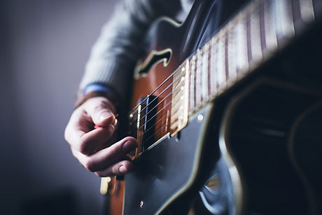 Man Playing Guitar