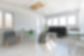 minimalistic living room interior, photo in cottage with wooden white celling, white painted walls,