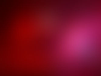 Santa rides on top of an Exmore fire truck with a firefighter at night