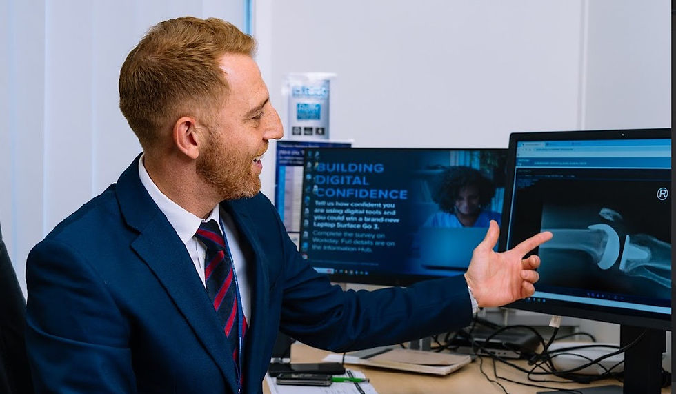 Mr David George reviewing a knee x-ray