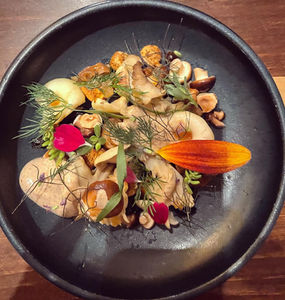 Mushroom plate with edible flowers