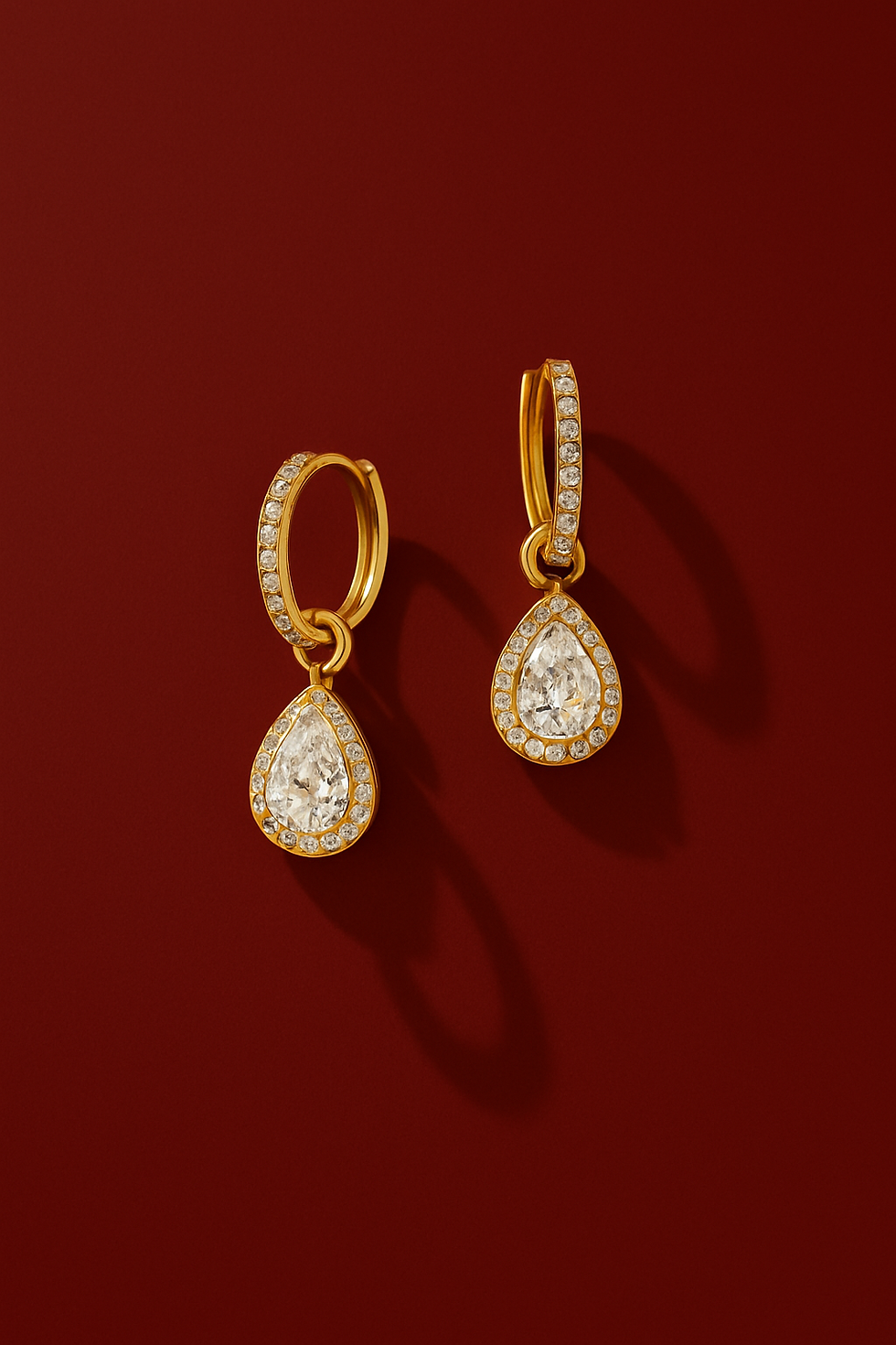 Pretty Yellow Gold Huggie Hoops with Sparkling Cubic Zirconia Teardrop Charms