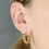 Thumbnail: Yellow Gold twisted Hoop Earrings