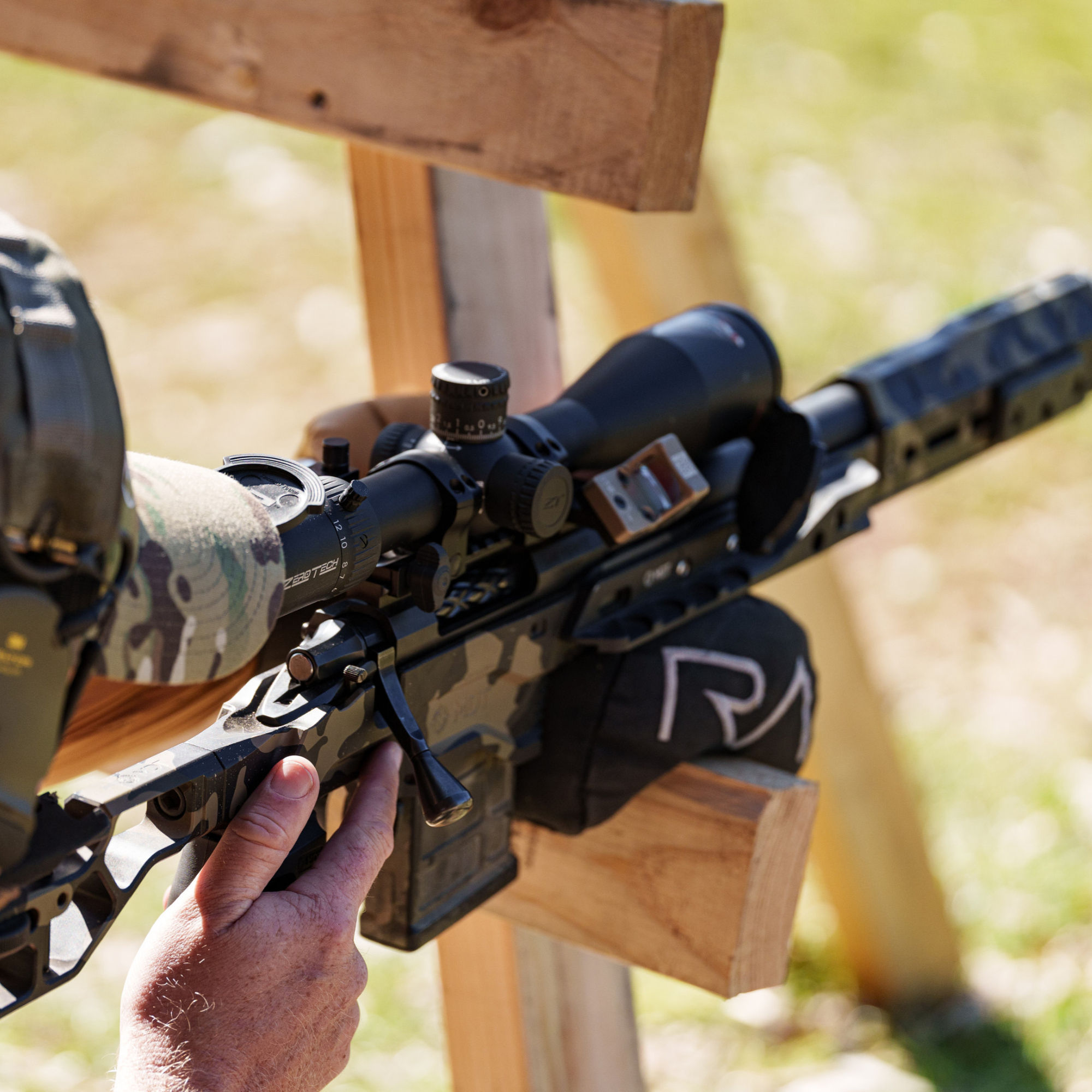 redacted acutal comp bag with rifle