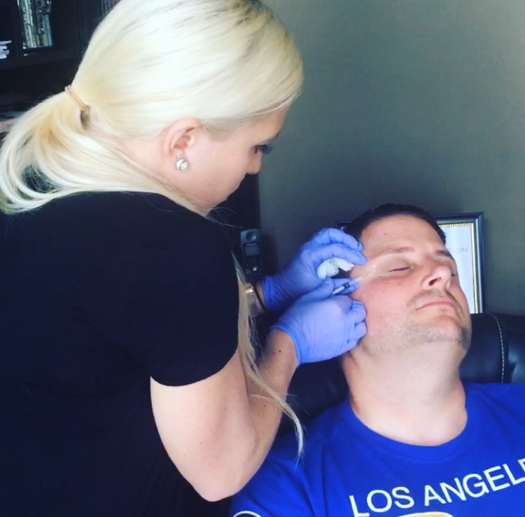 Nurse Lauren injecting Botox