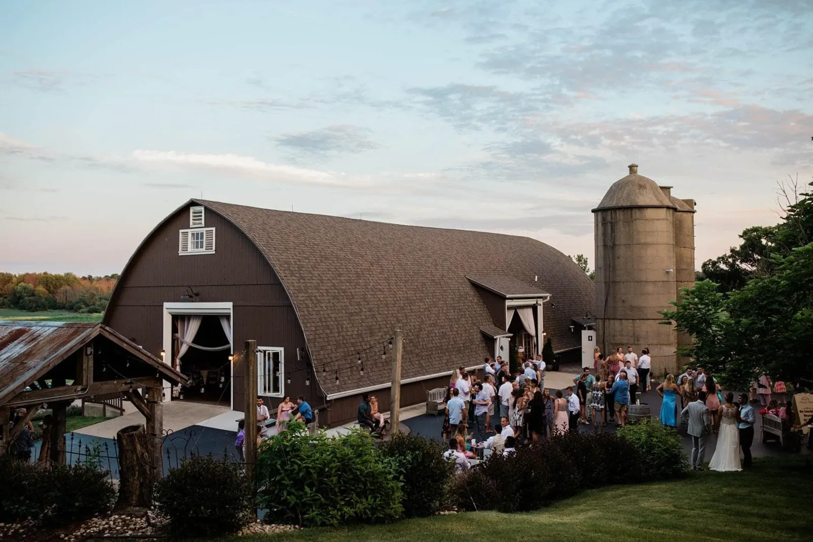 The beautiful barn form barn at trinity peak on a spring day with wedding guests