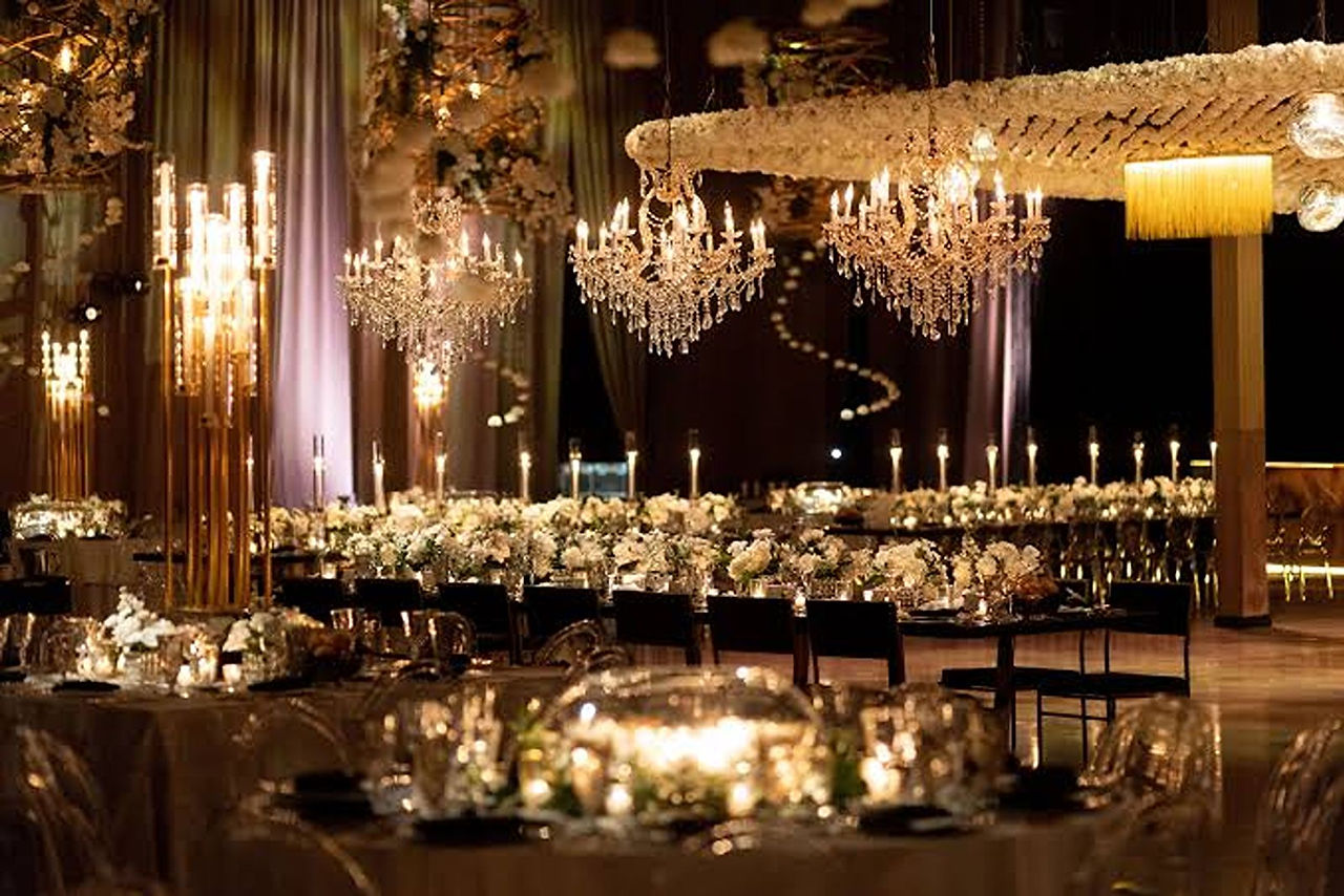 A whimsical fairytale of a wedding reception with candle light at The Geraghty, a Chicago wedding venue
