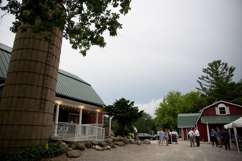 People gathered at homestead meadows farm on a cloudy day