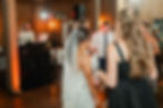 A SoundBlessed DJ rocking the dance floor at a wedding with the bride on the dancefloor.