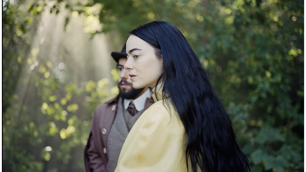 Bella Baxter, woman with long black hair and yellow dress