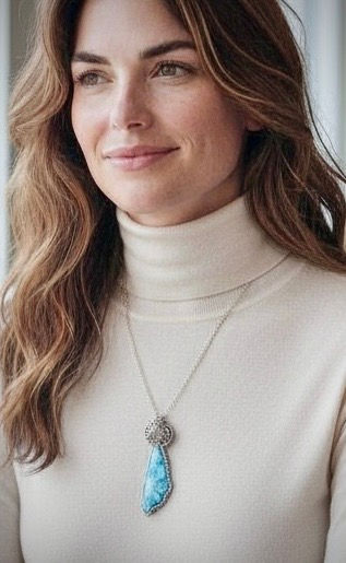 Larimar in Silver pendant worn on model, showing size, placement, and calming blue tones on chest.