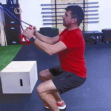 man working out on trx 
