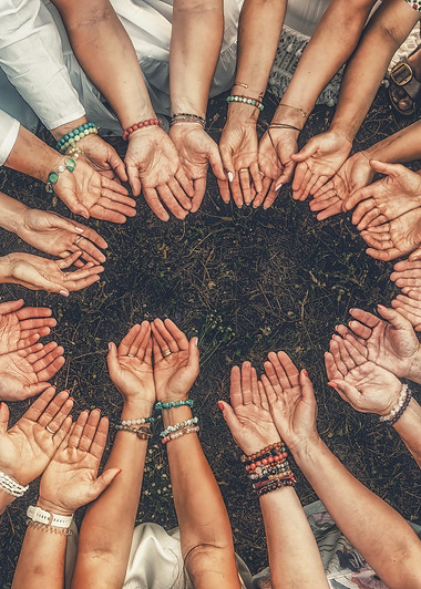Hands of girls form a circle. Ceremony space..jpg