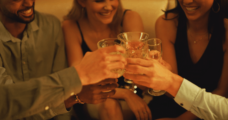 group-friends-and-drink-cheers-in-nightclub-at-pa-2023-12-12-13-55-52-utc-high.gif