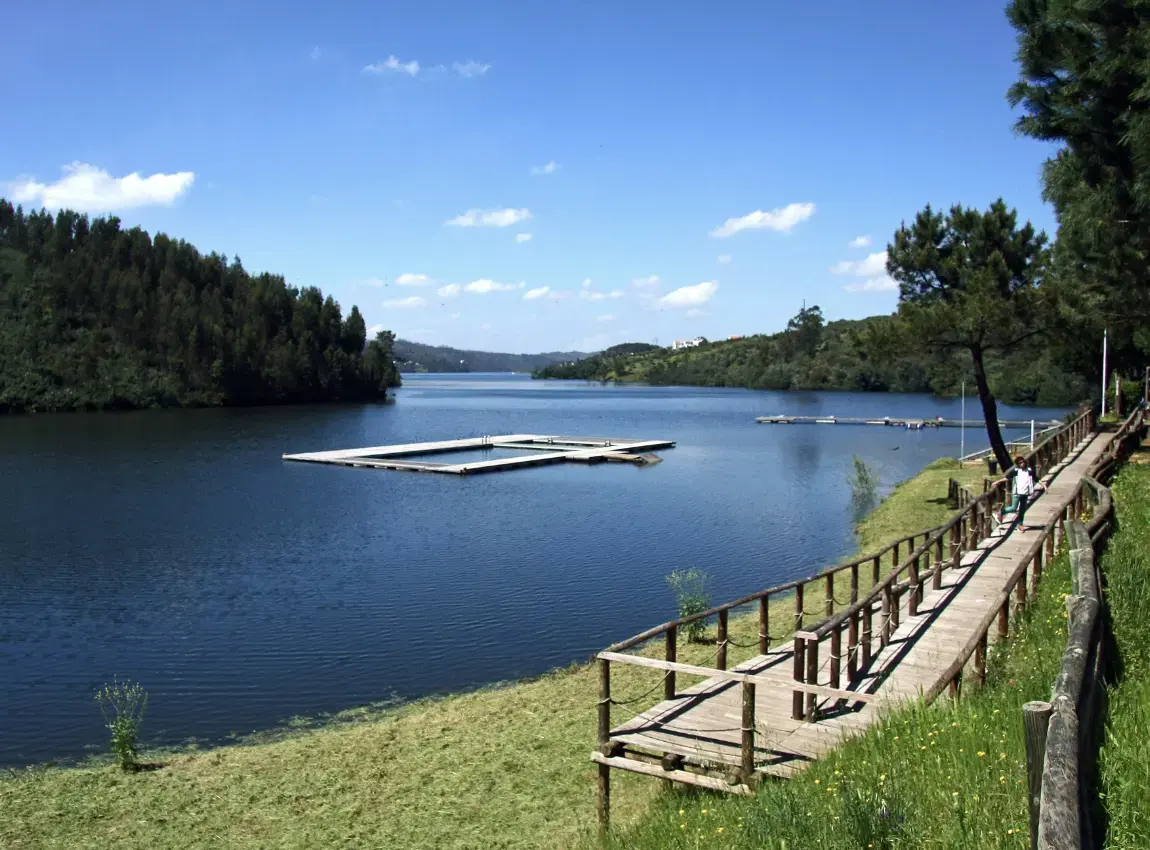 Aldeia do Mato river beach pool, Zêzere Blue Lake calm water, walkway, boat anchorage, Abrantes, Castelo de Bode, Portugal.
