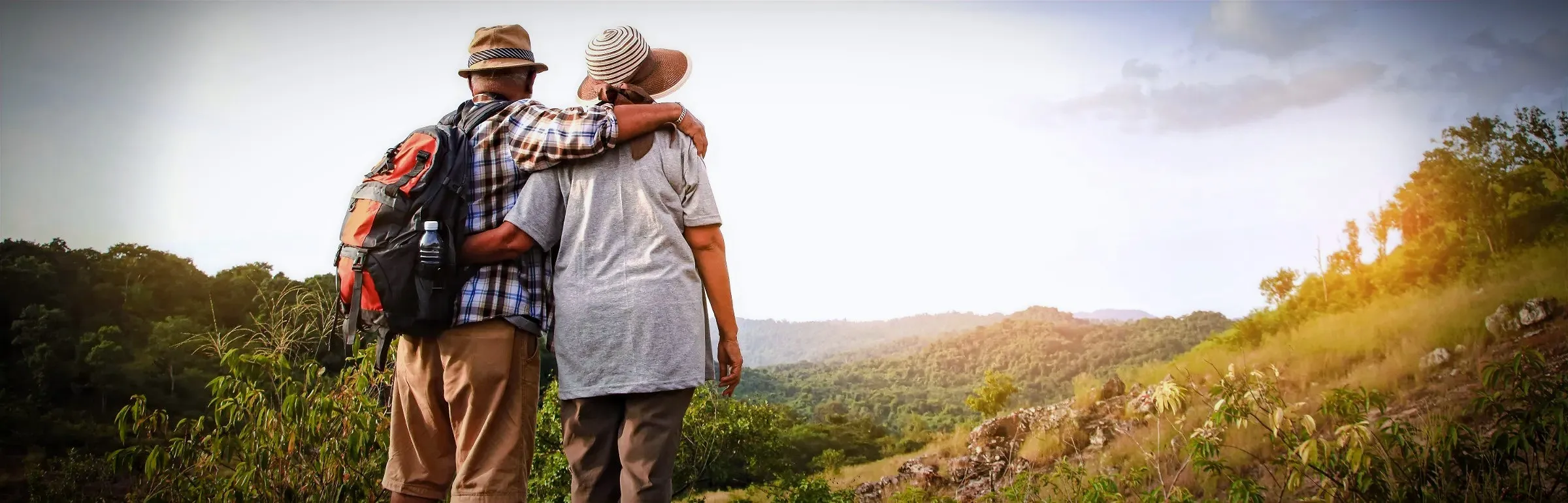 A senior couple enjoys the scenery while hiking around Castelo de Bode Lake in Ferreira do Zêzere, P