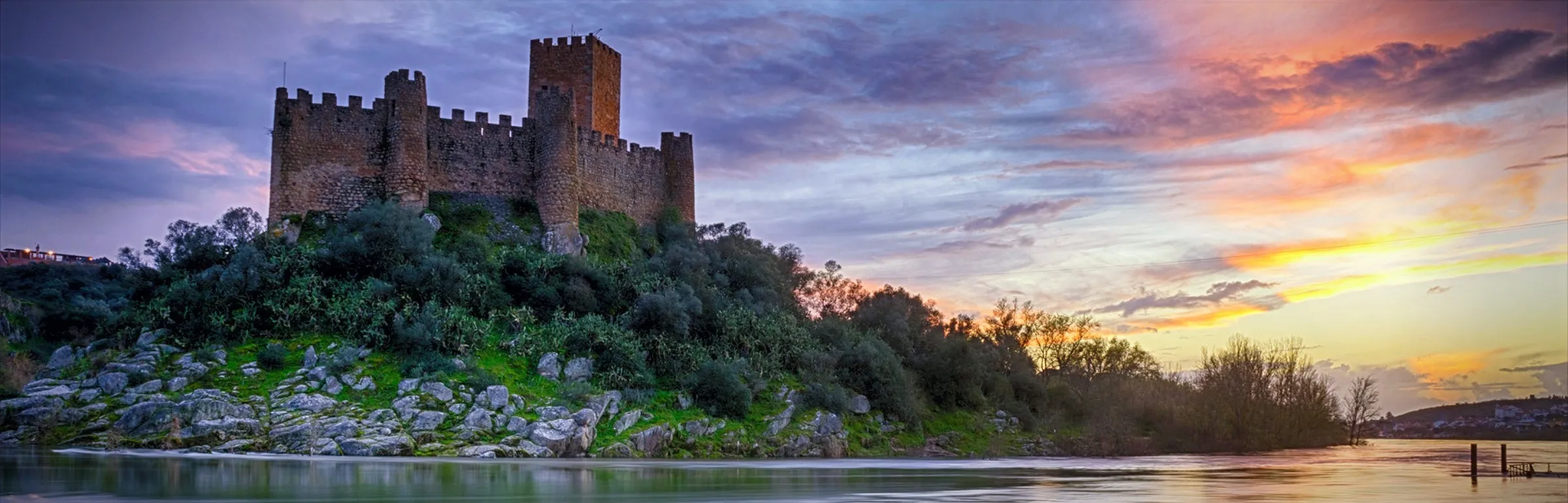 Almourol Templar castle in the middle of the Tagus river at sunset, Portugal.