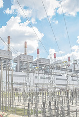 A power plant with lots of power lines i