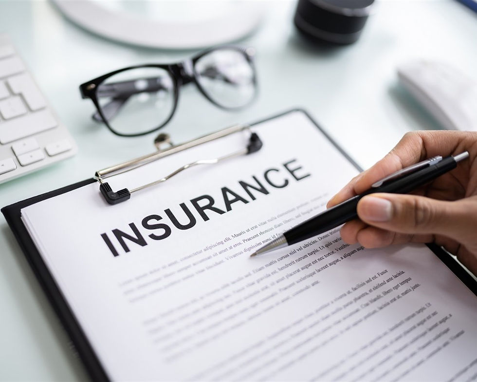 Insurance paperwork on a clipboard