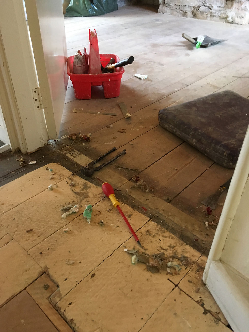 During renovation carpet removal and floor sanding preparation cottage Cubert Cornwall