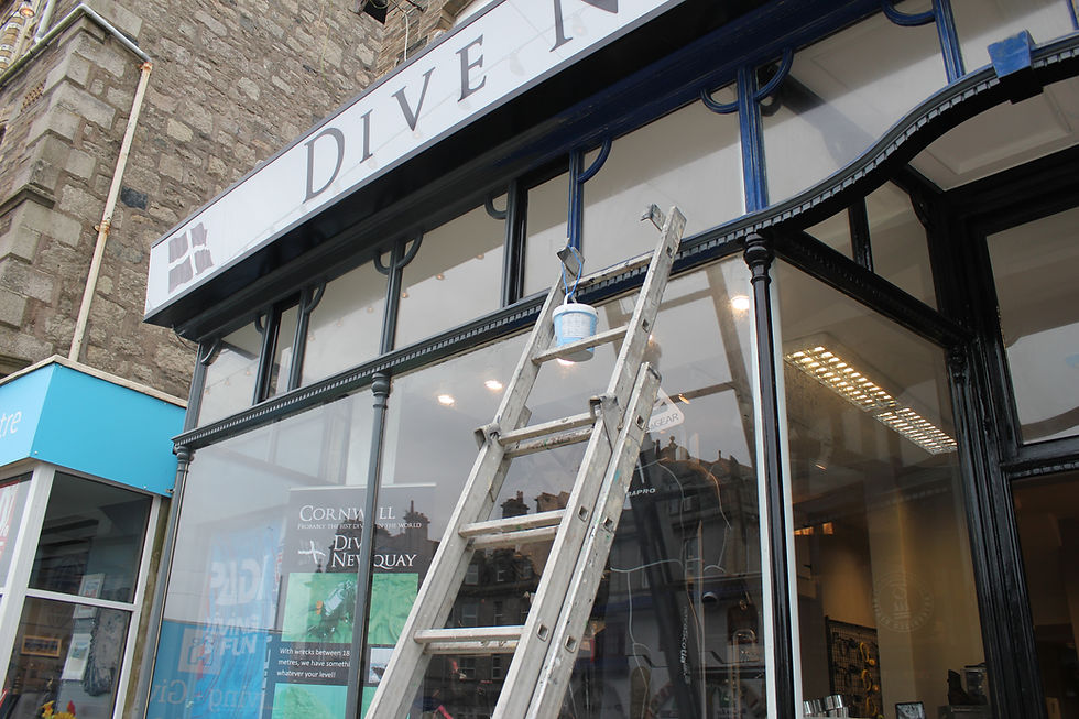 Exterior painting works during shop renovation works Newquay