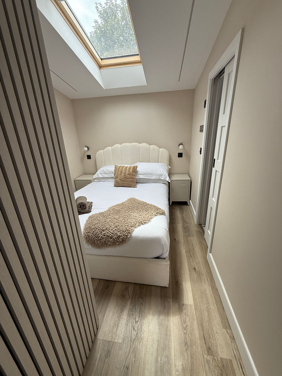 New flat bedroom with velux and painted walls bungalow conversion Newquay