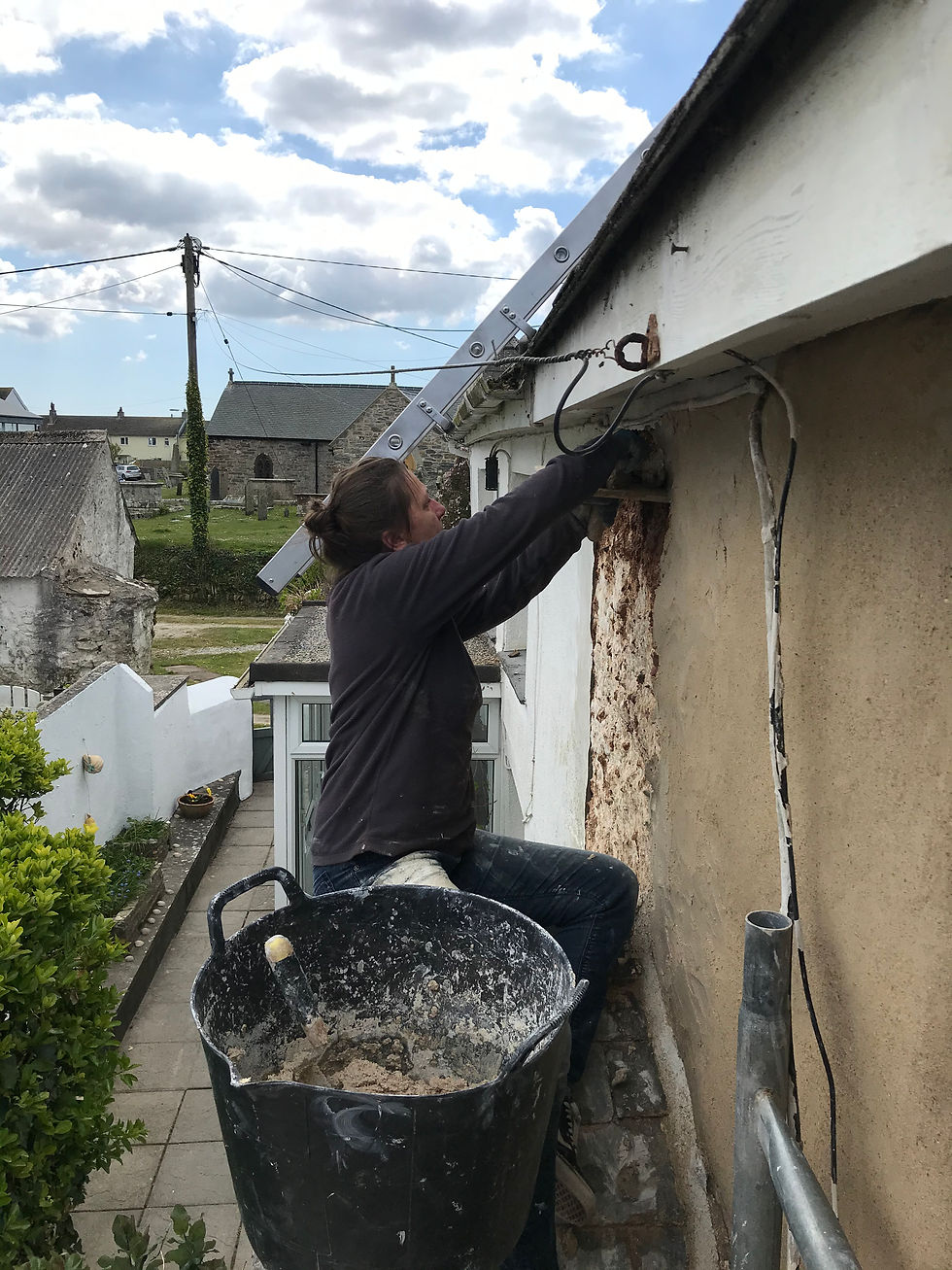 Cob wall rendering traditional methods Cornwall