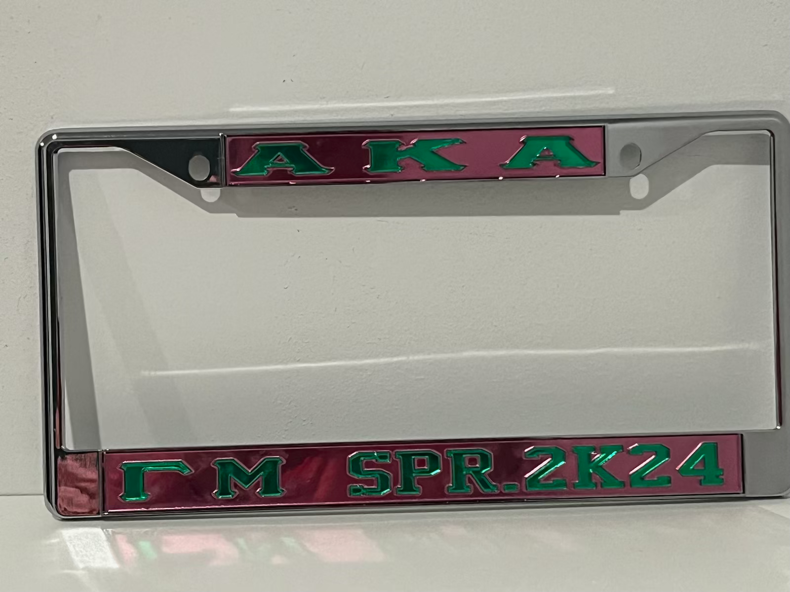 AKA GM Spr. 2K24 License Frame- Pink Background Green Letters