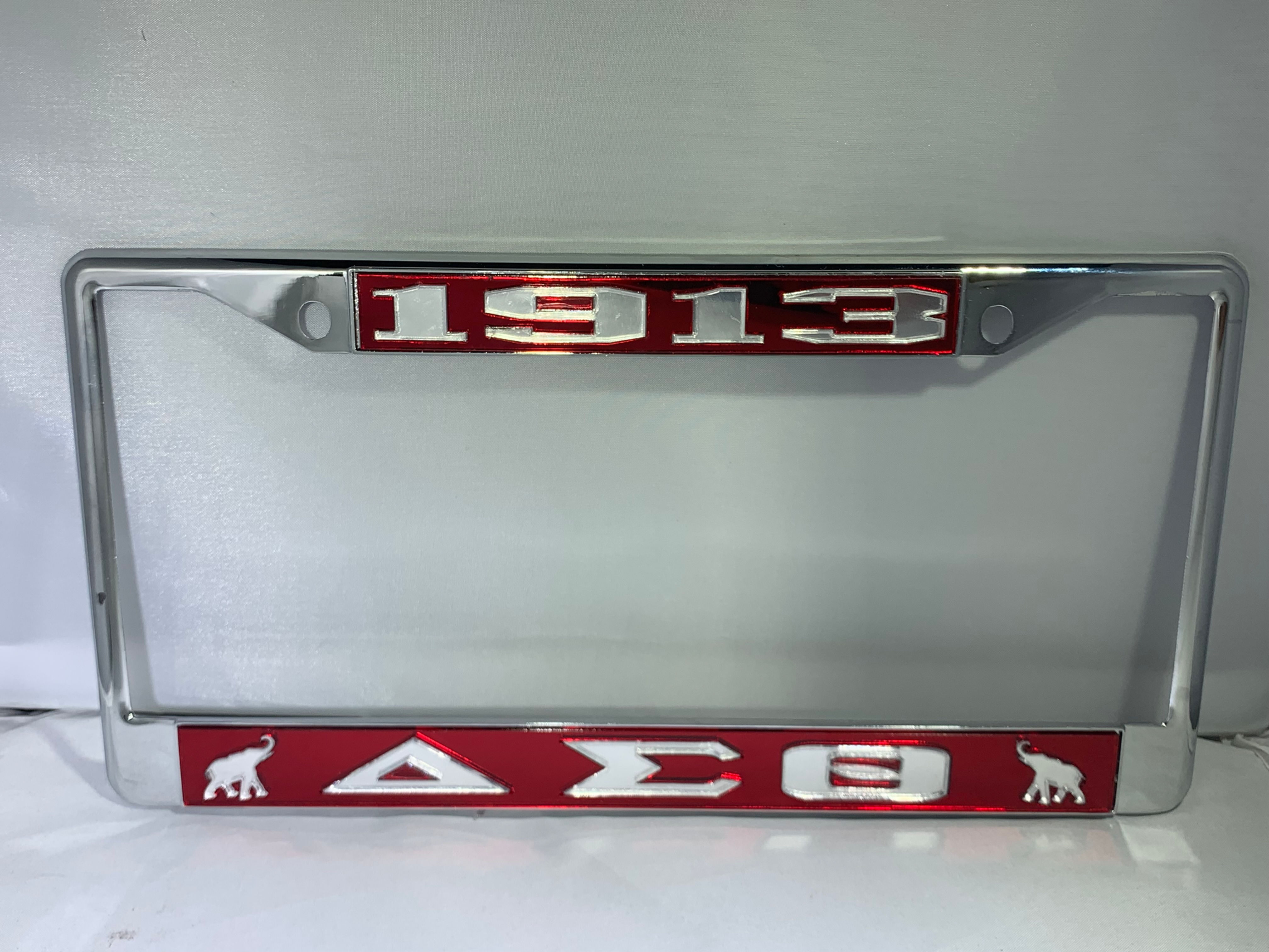 1913- DST w/ Elephants License Frame Red Background Mirror Letters