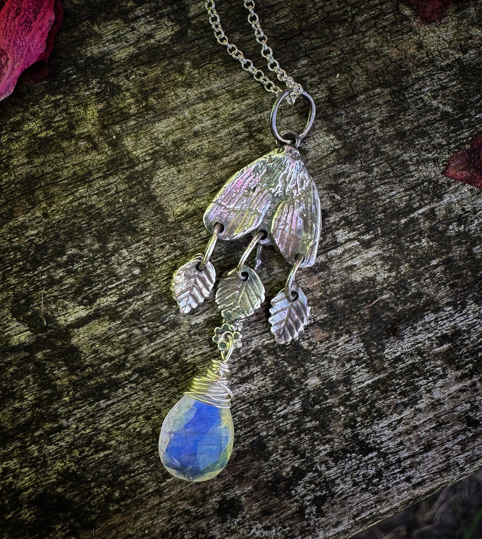 Moth and moonstone pendant