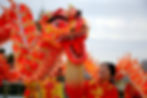 Large colourful dragon with Chinese Dragon Dancers